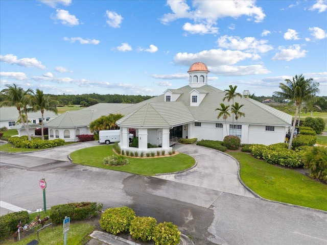 8365 SE Double Tree Dr, Hobe Sound, FL 33455 - view of property featuring curved driveway