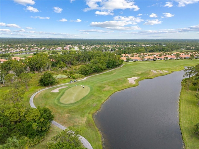 8365 SE Double Tree Dr, Hobe Sound, FL 33455 - aerial overview of property's location with nearby suburban area, a golf course, a large body of water, and a tree filled landscape