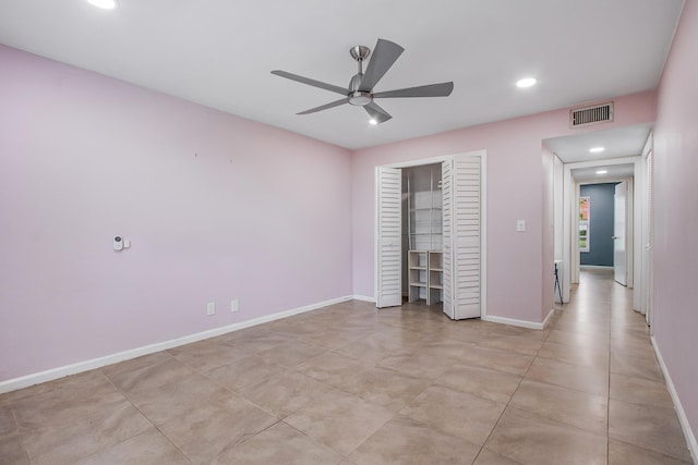 unfurnished bedroom with a closet, ceiling fan, baseboards, visible vents, and recessed lighting