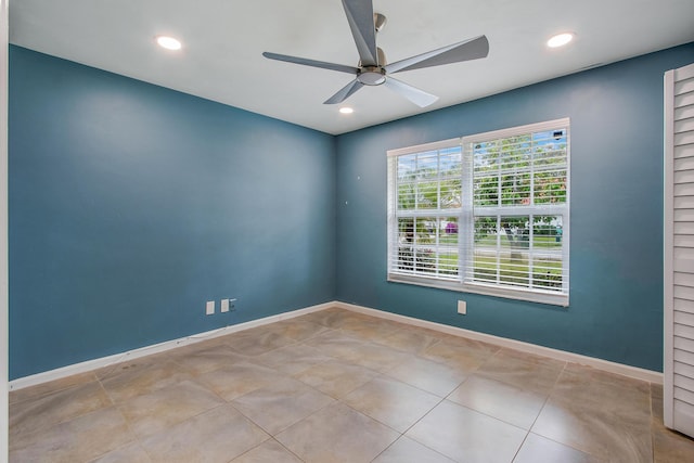 unfurnished room with baseboards, tile patterned flooring, recessed lighting, and ceiling fan