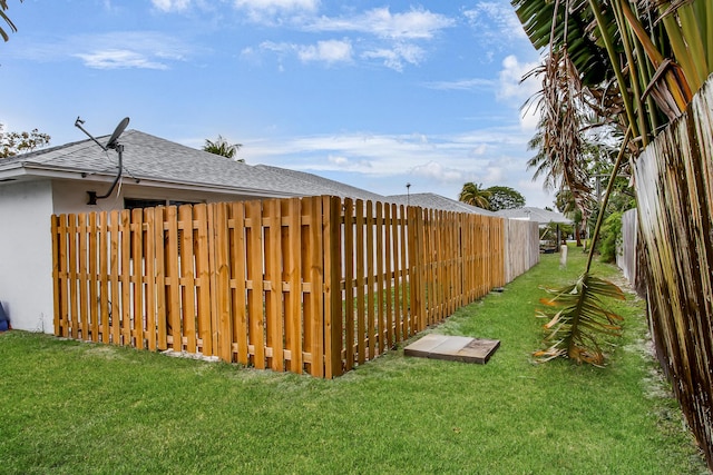 view of yard with fence
