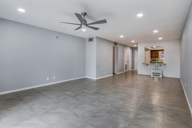 unfurnished living room featuring visible vents, baseboards, recessed lighting, a ceiling fan, and concrete flooring