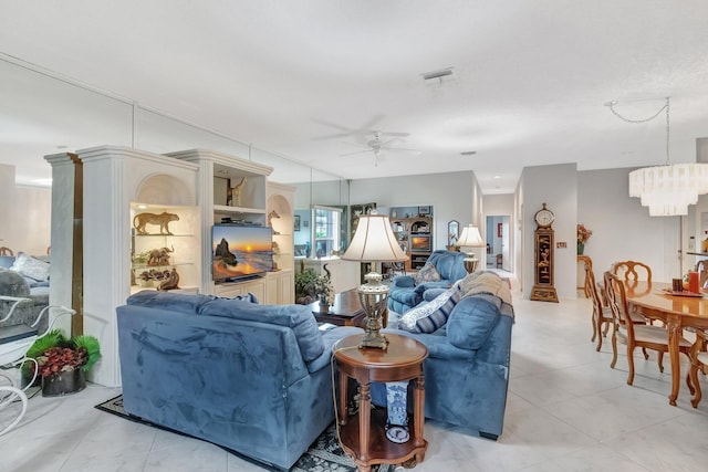 7829 Mansfield Hollow Rd, Delray Beach, FL 33446 - living area with visible vents and ceiling fan with notable chandelier