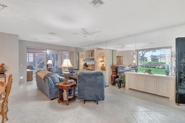 7829 Mansfield Hollow Rd, Delray Beach, FL 33446 - living room featuring ceiling fan and visible vents