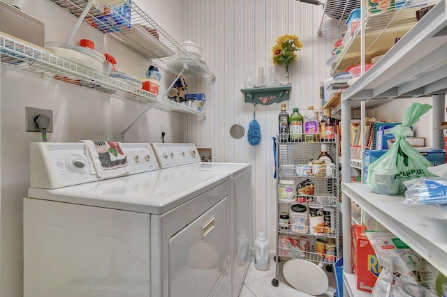 7829 Mansfield Hollow Rd, Delray Beach, FL 33446 - laundry room with tile patterned flooring, washer and clothes dryer, and laundry area