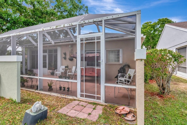 7829 Mansfield Hollow Rd, Delray Beach, FL 33446 - rear view of house with a lanai, a patio, and stucco siding