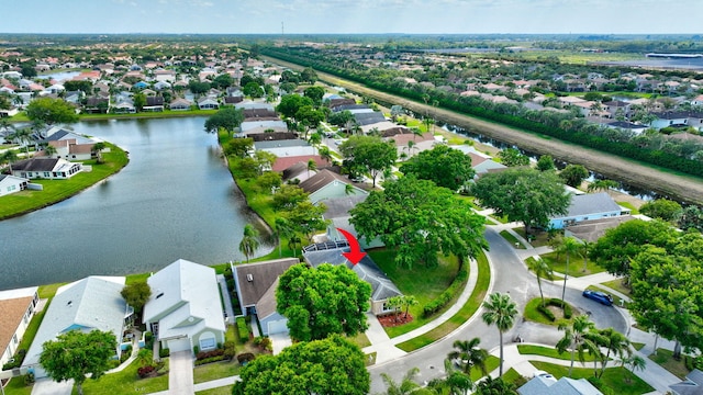 7829 Mansfield Hollow Rd, Delray Beach, FL 33446 - drone / aerial view with a residential view and a water view
