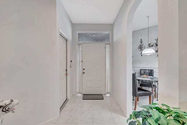 7829 Mansfield Hollow Rd, Delray Beach, FL 33446 - hall with arched walkways and baseboards