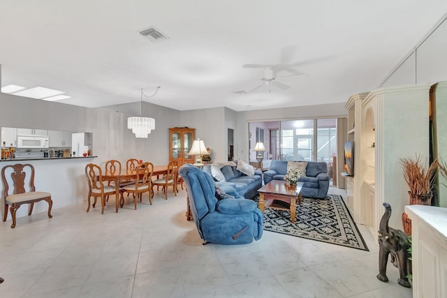 7829 Mansfield Hollow Rd, Delray Beach, FL 33446 - living area with visible vents and ceiling fan with notable chandelier