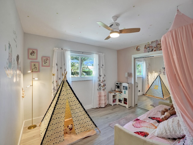 3821 NE 29th Ave, Lighthouse Point, FL 33064 - recreation room featuring light wood-type flooring, baseboards, and a ceiling fan
