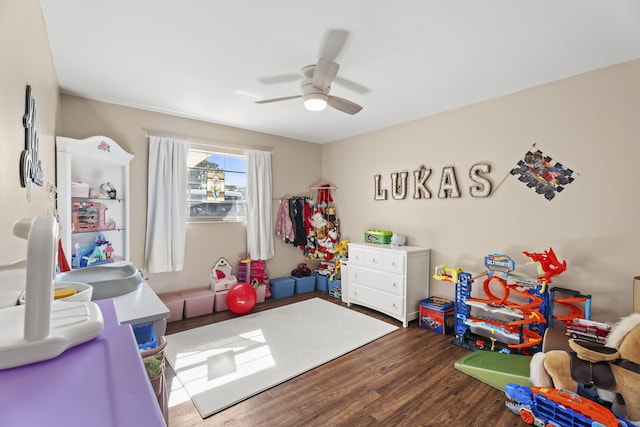 1728 SE Harrison St, Stuart, FL 34997 - rec room with a ceiling fan and wood finished floors