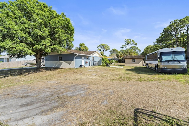1728 SE Harrison St, Stuart, FL 34997 - view of yard featuring fence