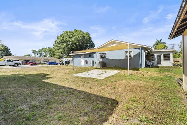 1728 SE Harrison St, Stuart, FL 34997 - view of yard with central AC