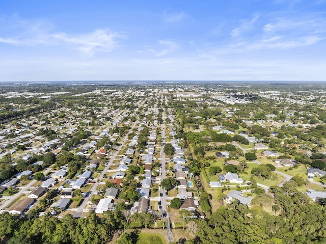 1728 SE Harrison St, Stuart, FL 34997 - drone / aerial view with a residential view