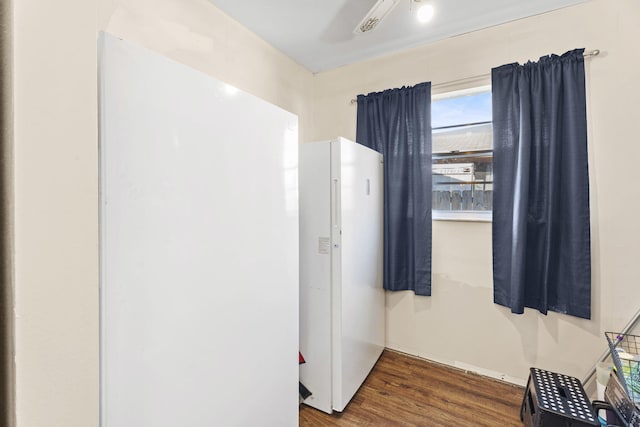 1728 SE Harrison St, Stuart, FL 34997 - interior space with baseboards and wood finished floors
