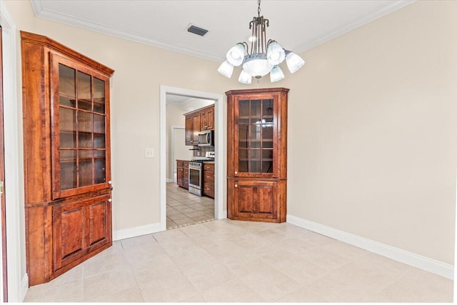 dining area featuring an inviting chandelier, baseboards, ornamental molding, and visible vents