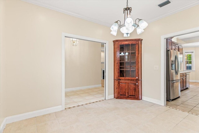 unfurnished dining area featuring visible vents, crown molding, an inviting chandelier, light tile patterned flooring, and baseboards