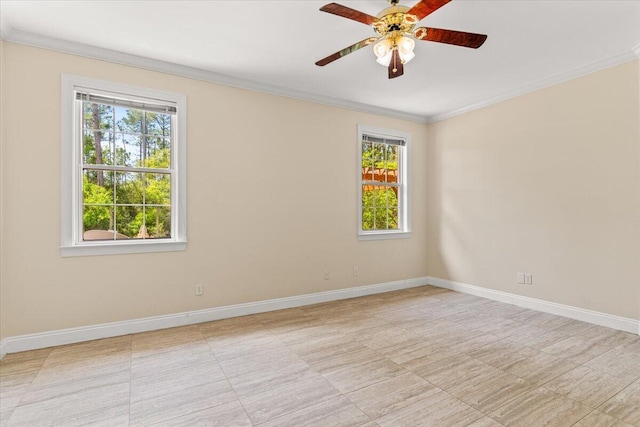 empty room with baseboards, ornamental molding, and ceiling fan