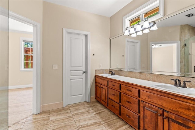 full bath with tile patterned floors, visible vents, and a sink