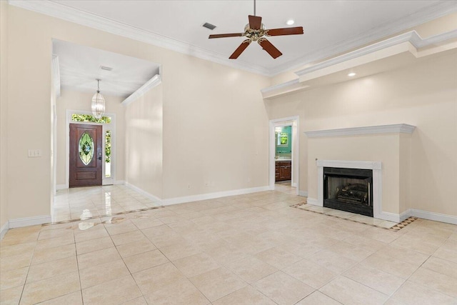 unfurnished living room featuring ceiling fan, visible vents, crown molding, tile patterned floors, and baseboards