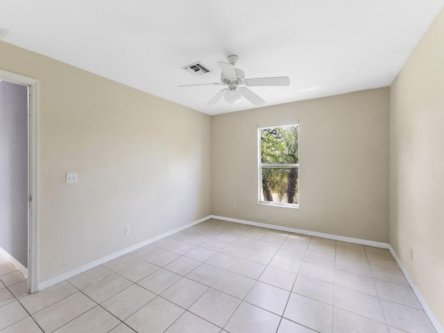 7745 99th Ct, Vero Beach, FL 32967 - spare room featuring light tile patterned flooring, visible vents, and a ceiling fan