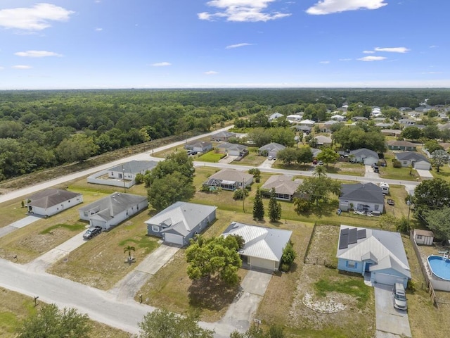 7745 99th Ct, Vero Beach, FL 32967 - bird's eye view with a residential view and a forest view