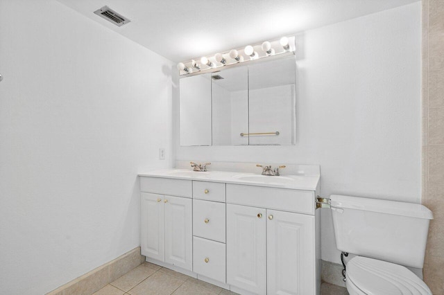 full bathroom with visible vents, toilet, baseboards, and a sink
