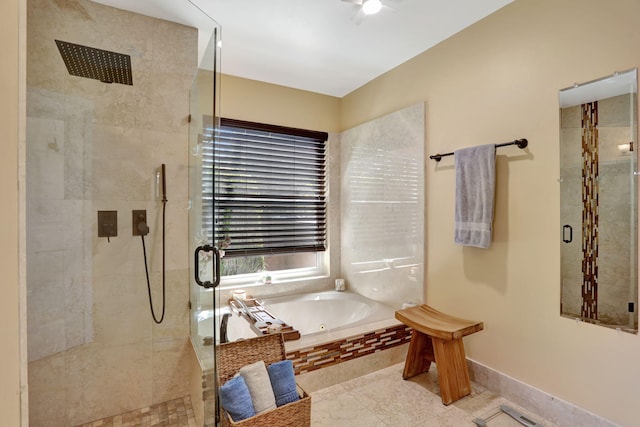 full bath featuring ceiling fan, a stall shower, and a tub with jets