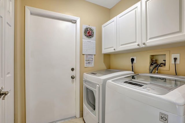 laundry area featuring cabinet space and washer and dryer
