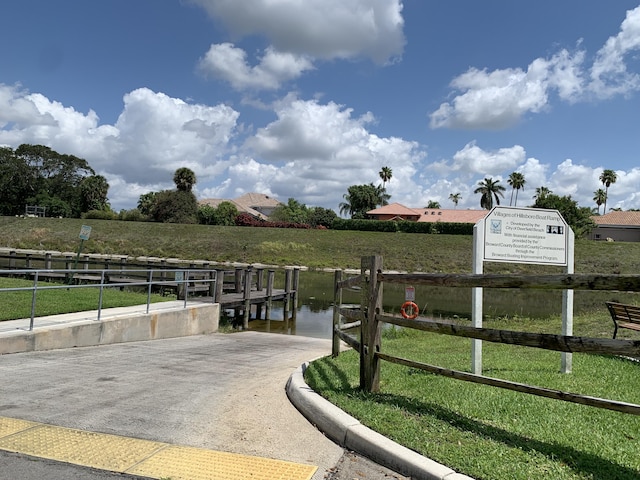 385 NW 37th Way, Deerfield Beach, FL 33442 - dock area with a water view