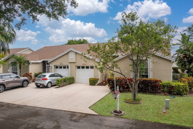 6209 Pond Tree Ct, Greenacres, FL 33463 - view of front facade featuring an attached garage, stucco siding, a front yard, and concrete driveway