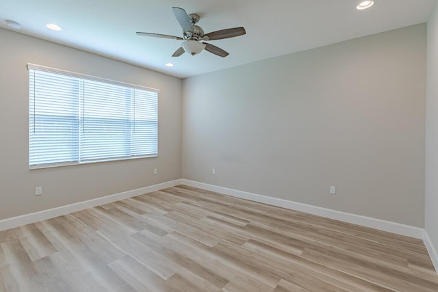 13509 SW Oceanus Blvd, Port Saint Lucie, FL 34987 - unfurnished room with ceiling fan, light wood-type flooring, baseboards, and recessed lighting