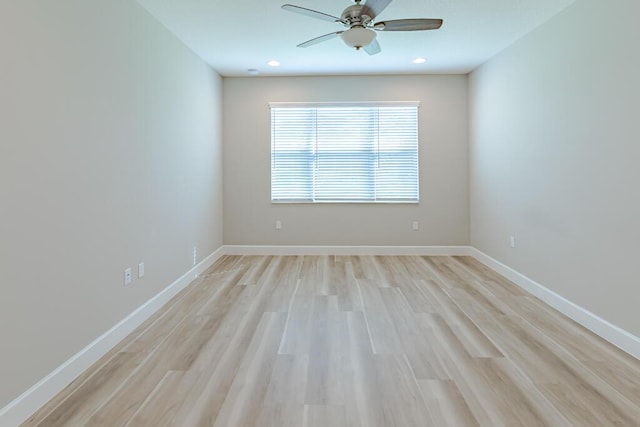 13509 SW Oceanus Blvd, Port Saint Lucie, FL 34987 - empty room with a ceiling fan, light wood-type flooring, baseboards, and recessed lighting