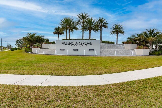 13509 SW Oceanus Blvd, Port Saint Lucie, FL 34987 - community / neighborhood sign with a yard
