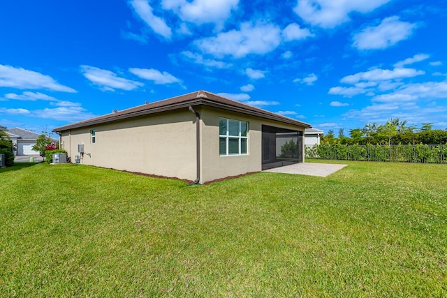 13509 SW Oceanus Blvd, Port Saint Lucie, FL 34987 - rear view of property with a patio area and stucco siding