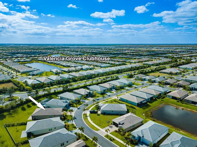 13509 SW Oceanus Blvd, Port Saint Lucie, FL 34987 - aerial perspective of suburban area with a nearby body of water
