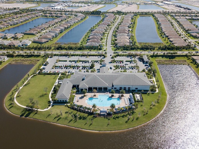 13509 SW Oceanus Blvd, Port Saint Lucie, FL 34987 - view of property location with a pool, a large body of water, and nearby suburban area