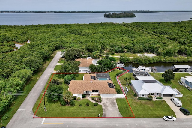 1904 6th Ave SE, Vero Beach, FL 32962 - birds eye view of property featuring a forest view and a water view