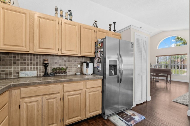 13029 Meadowbreeze Dr, Wellington, FL 33414 - kitchen featuring tasteful backsplash, light brown cabinetry, stainless steel refrigerator with ice dispenser, and dark wood-style floors