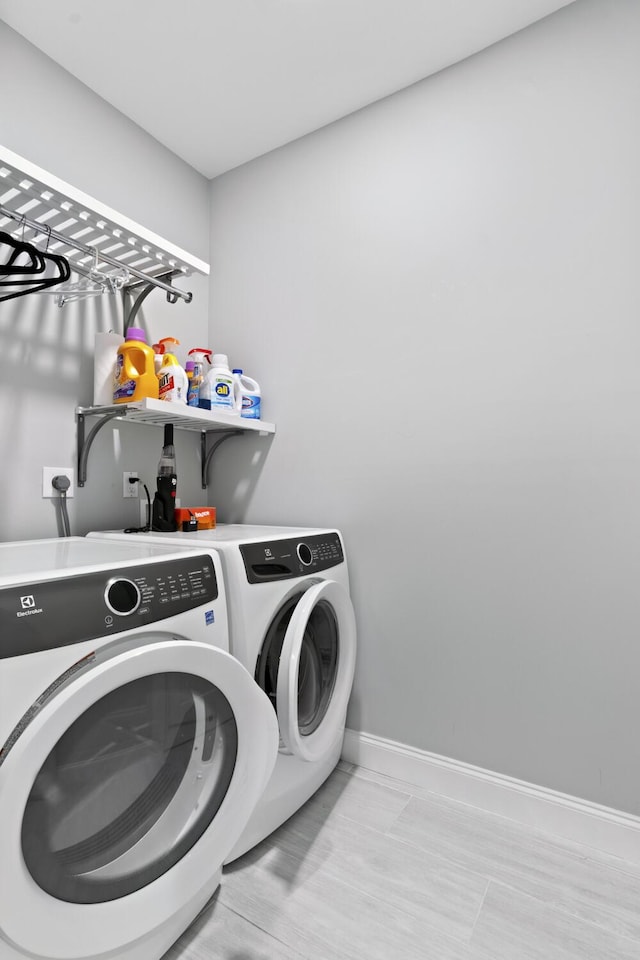 17744 Candlewood Ter, Boca Raton, FL 33487 - clothes washing area with separate washer and dryer, laundry area, and baseboards