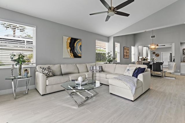 17744 Candlewood Ter, Boca Raton, FL 33487 - living area with visible vents, a healthy amount of sunlight, light wood-style flooring, and ceiling fan with notable chandelier