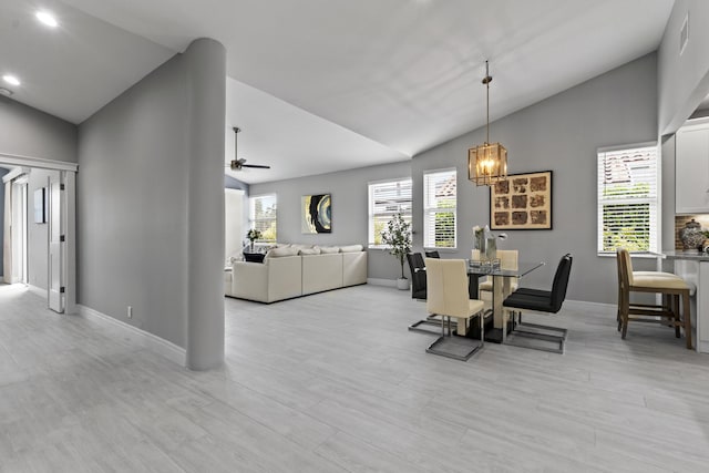 17744 Candlewood Ter, Boca Raton, FL 33487 - dining space with baseboards, vaulted ceiling, plenty of natural light, and visible vents