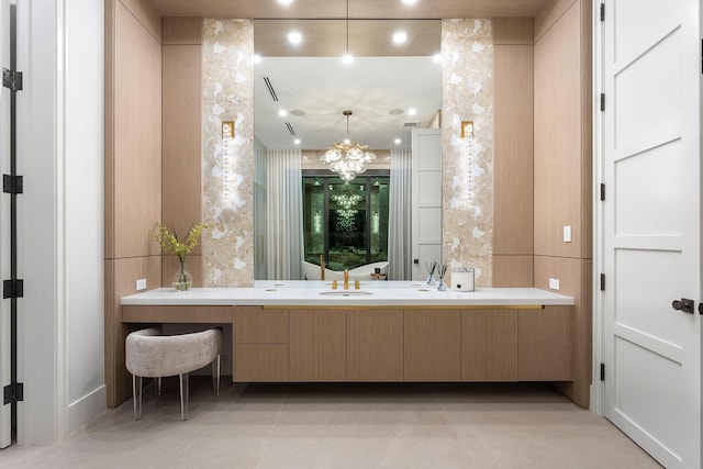 207 W Coconut Palm Rd, Boca Raton, FL 33432 - bathroom with an inviting chandelier and vanity