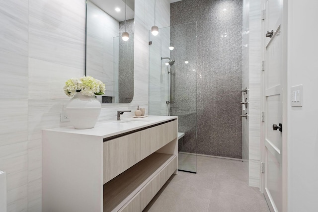 207 W Coconut Palm Rd, Boca Raton, FL 33432 - washroom featuring a healthy amount of sunlight, stacked washer / dryer, cabinet space, and a sink