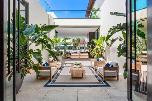 207 W Coconut Palm Rd, Boca Raton, FL 33432 - exterior space with a patio and an outdoor hangout area