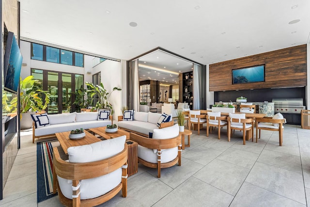 207 W Coconut Palm Rd, Boca Raton, FL 33432 - living area featuring light tile patterned floors and recessed lighting