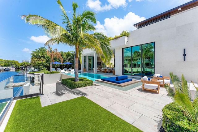 207 W Coconut Palm Rd, Boca Raton, FL 33432 - pool featuring a patio