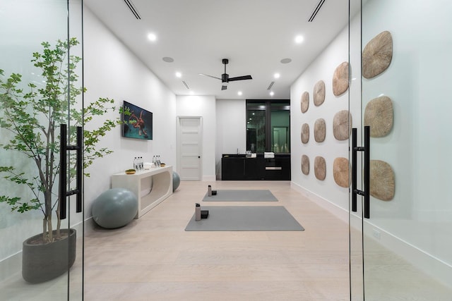 207 W Coconut Palm Rd, Boca Raton, FL 33432 - exercise room featuring recessed lighting, wood finished floors, and ceiling fan