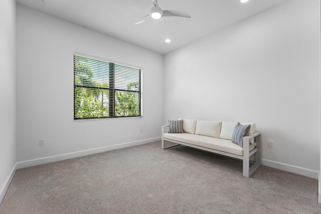 living area with carpet, a ceiling fan, baseboards, and recessed lighting