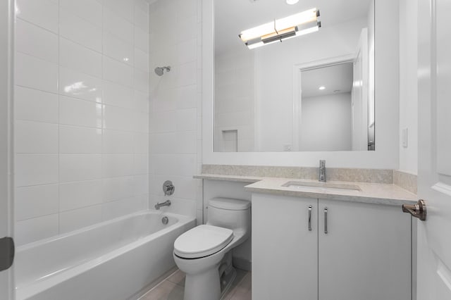 full bath with toilet, shower / bath combination, and vanity